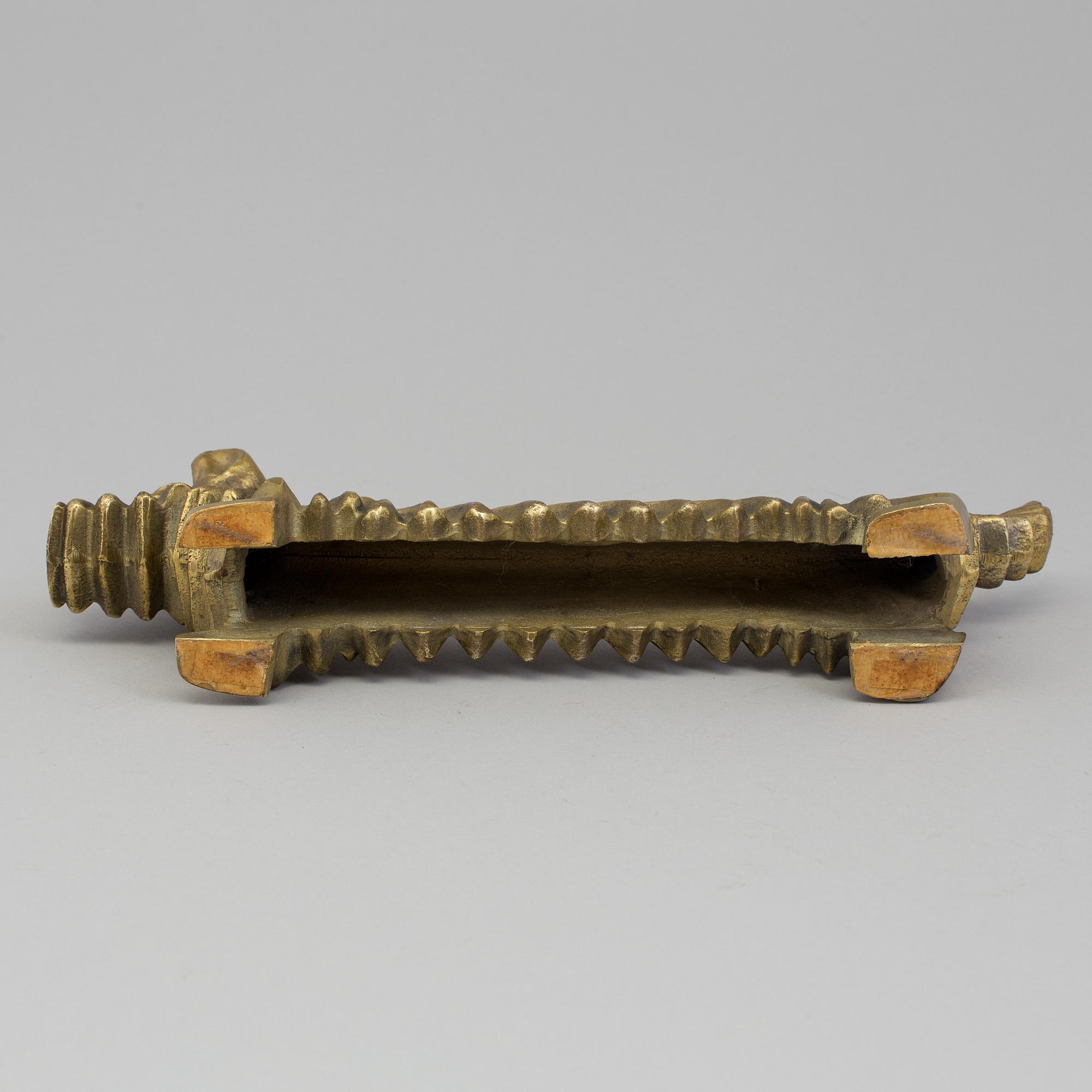 A second half of the 20th century andiron.