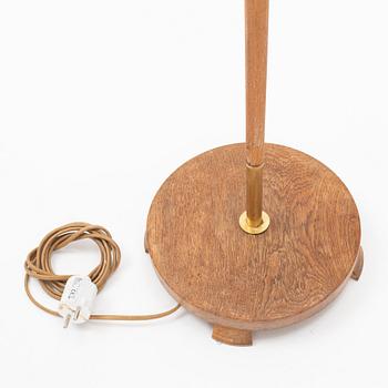 An oak three armed floor lamp from AB Armaturhantverk Göteborg.
