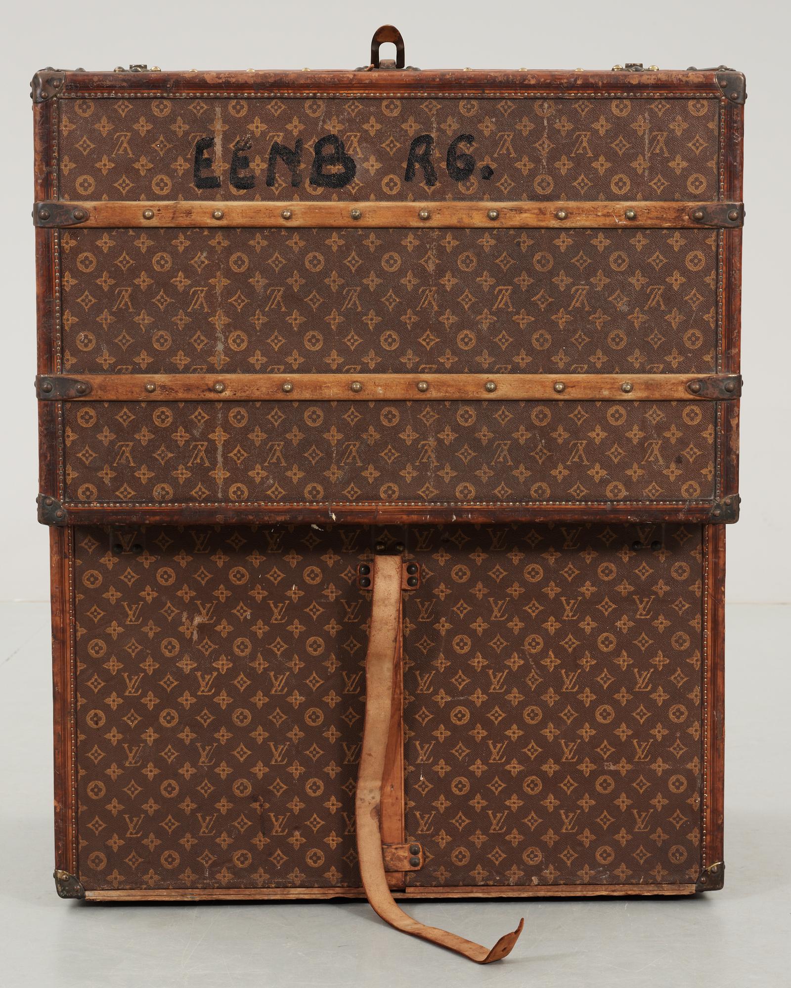 An early 20th cent monogram canvas trunk by Louis Vuitton.