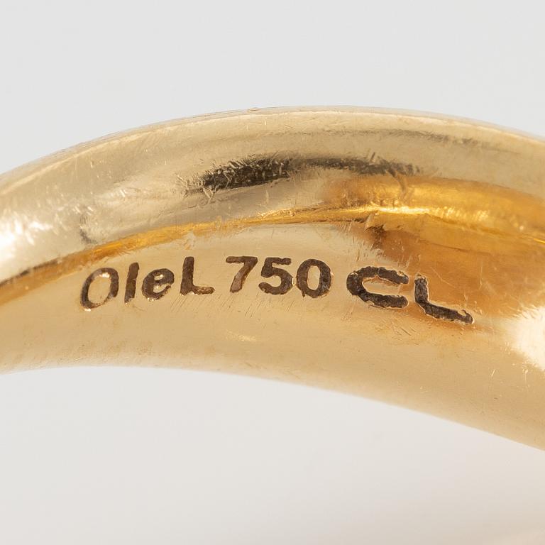 Ole Lynggaard, ring, large Lotus, 18K gold with cabochon-cut black stone probably onyx with brilliant-cut diamonds.