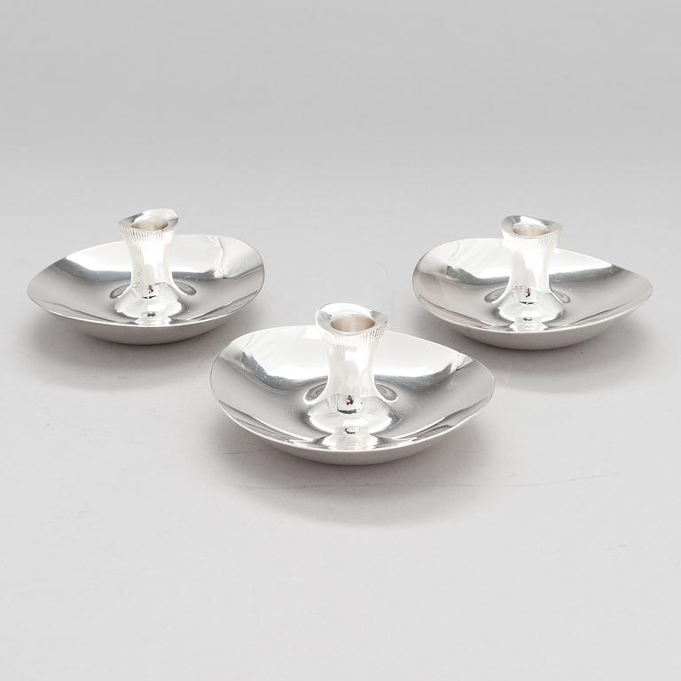 TAPIO WIRKKALA, Three silver candlesticks, Hopeatehdas Oy, Helsinki 1957-65.