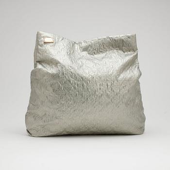 LOUIS VUITTON, a monogram silver colored clutch.