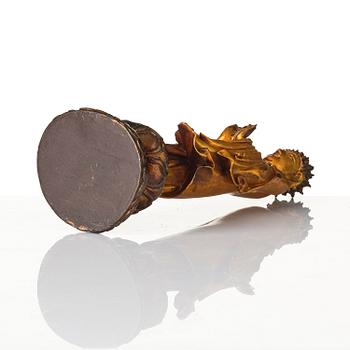 A lacquer figure of a standing Buddha, late Ming dynasty/early Qing dynasty.