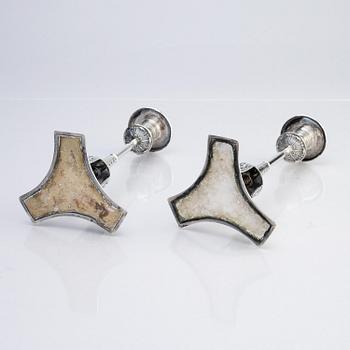 A pair of Swedish early 19th century silver candlesticks, marks of Adolf Zethelius, Stockholm 1817.