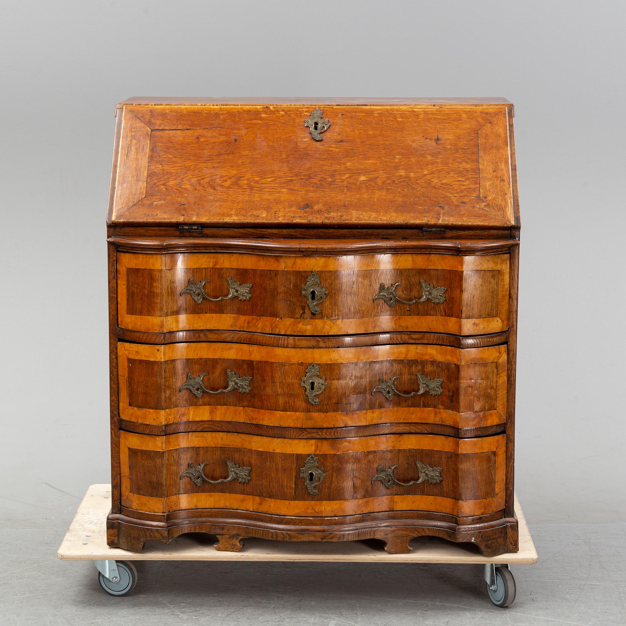 A late baroque secretaire chest of drawers, 18th century, northen Germany.