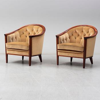 A pair of mahogany 'Fabiola' armchairs from Bröderna Andersson, second half of the 20th Century.