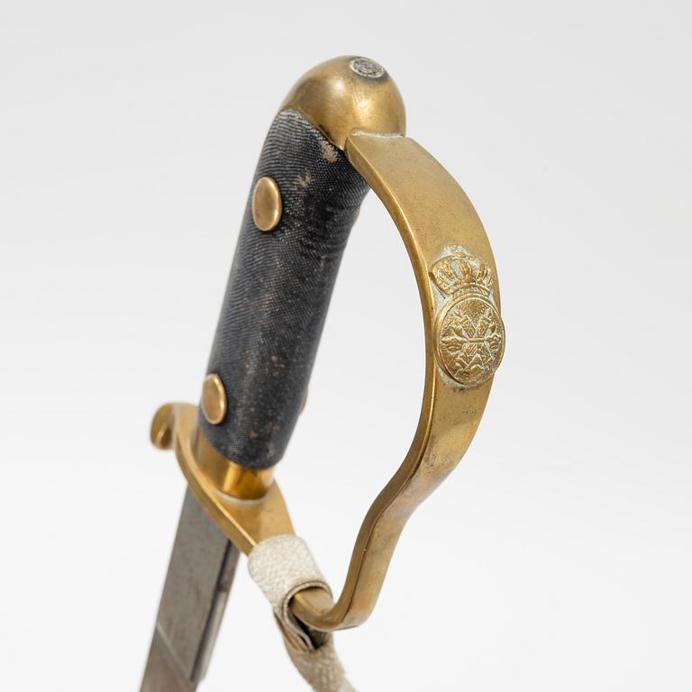 A Swedish police sabre with scabbard, drom around the year 1900.