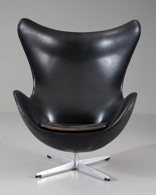 An Arne Jacobsen black leather 'Egg Chair', Fritz Hansen, Denmark 1964.