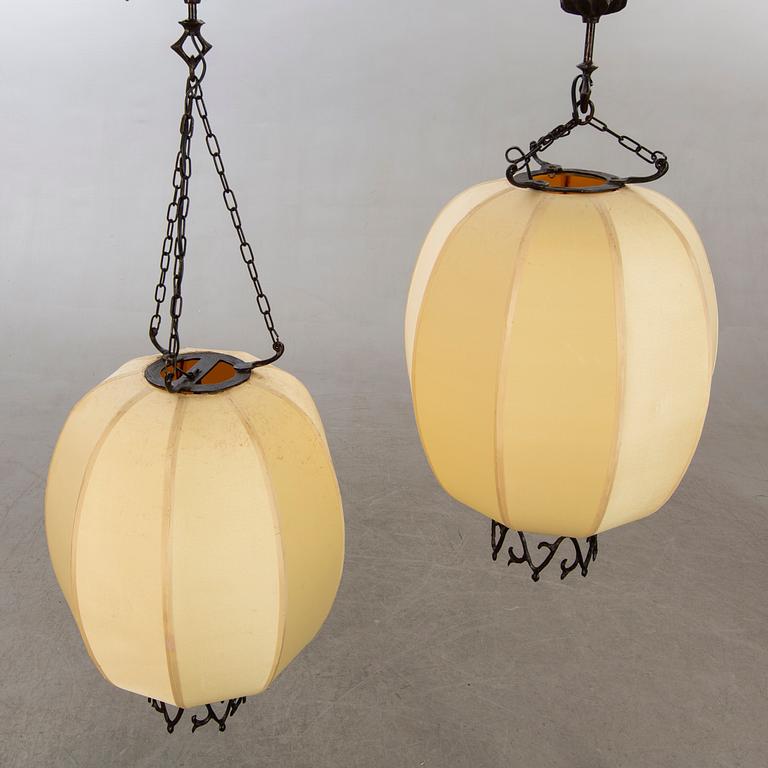 A pair of Chinese 20th century ceiling lamps.