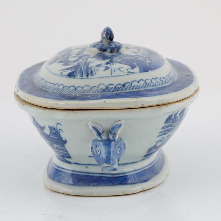 A blue and white tureen with cover, a plate and a butter tureen with cover and stand, China, 18th and 19th century.