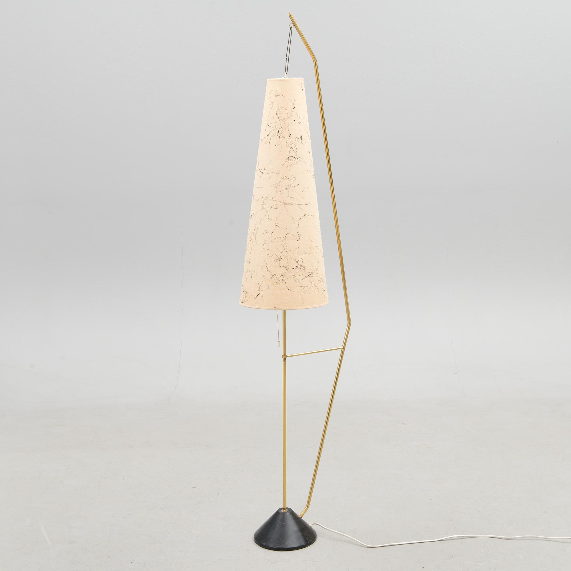 A mid-20th Century floor lamp.