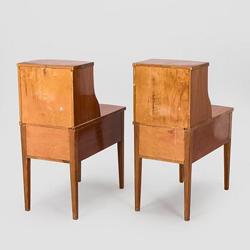 A pair of 20th century bedside tables.