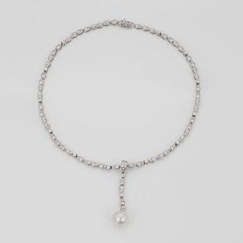 A Boucheron diamond, 5.89 cts in total, and cultured South Sea pearl, Ø 12.4 mm, necklace.