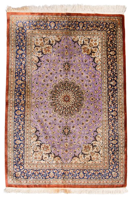 A SILK CARPET, Ghom, signed, 150x102 cm.