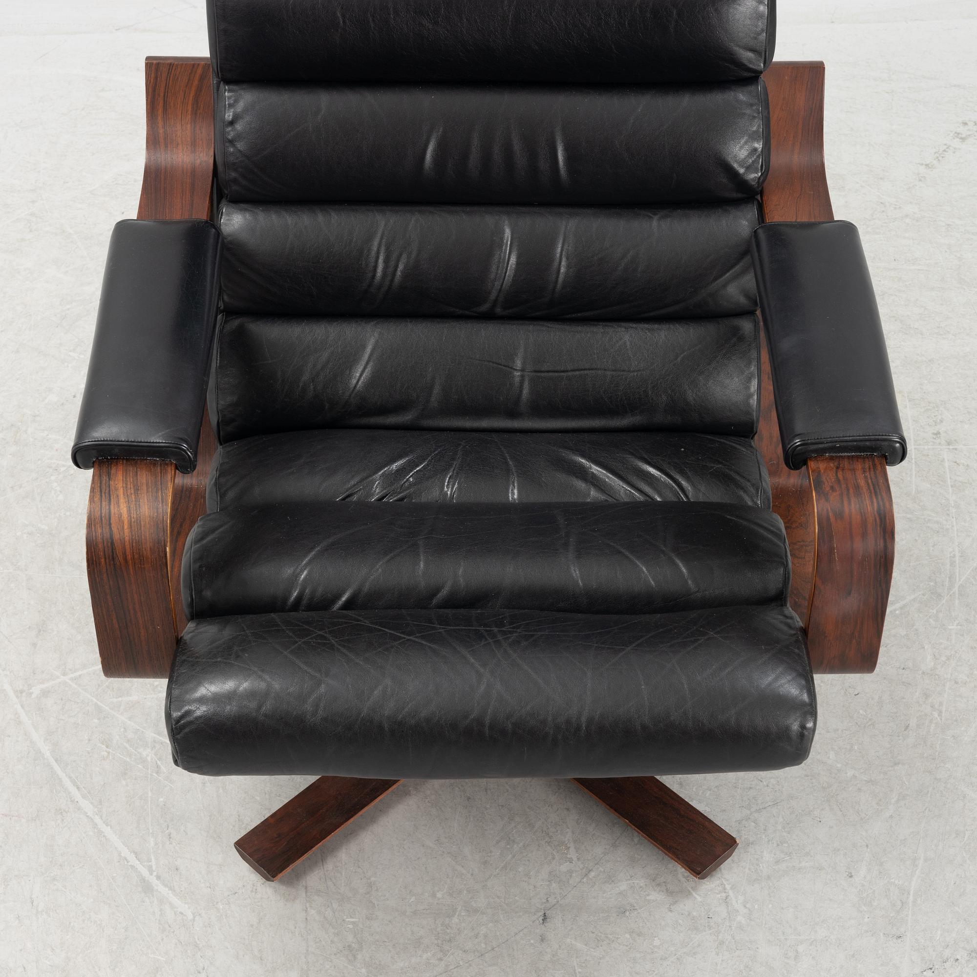 Karl-Erik Ekselius, a rosewood swivel armchair from JOC Vetlanda, 1980's.