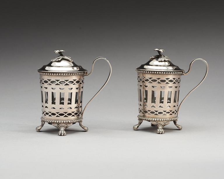 A pair of Swedish 18th century silver mustard-pots and spoons, makers mark of Simson Ryberg, Stockholm 1794.