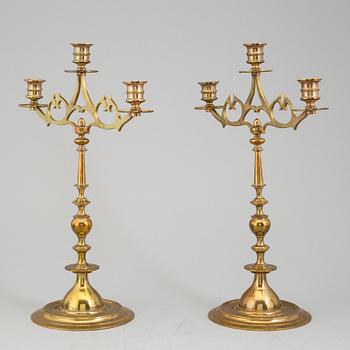 A PAIR OF BRASS CANDELABRA, no 115, EOS, Jönköping, first half of the 20th century.