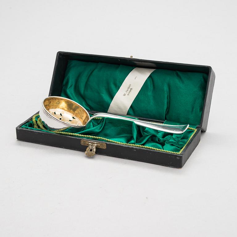 A late 18th-century parcel-gilt silver sprinkle spoon, maker's mark of Anders Törnqvist the elder, 1782.