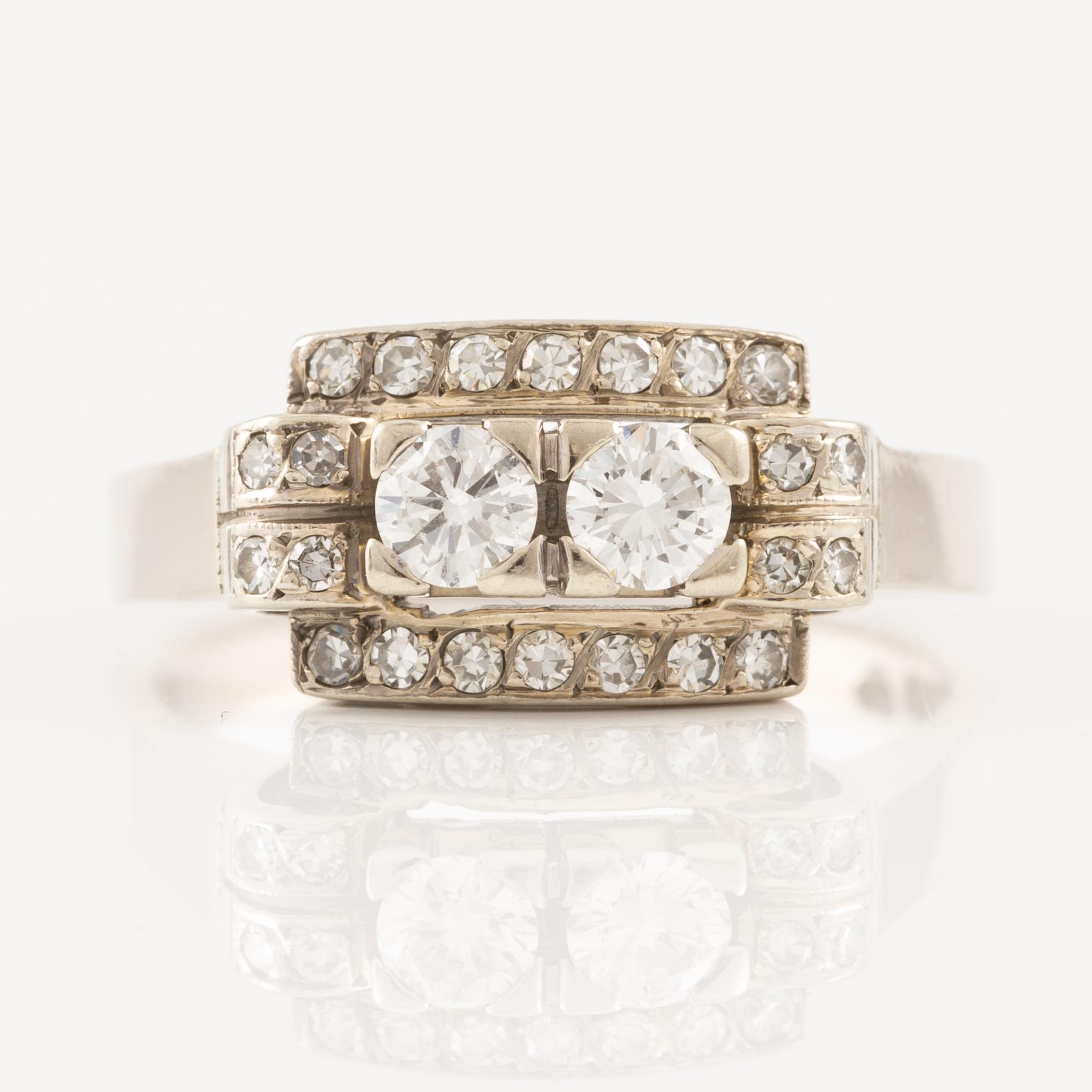 Ring in 18K white gold set with round brilliant-cut and eight-cut diamonds.