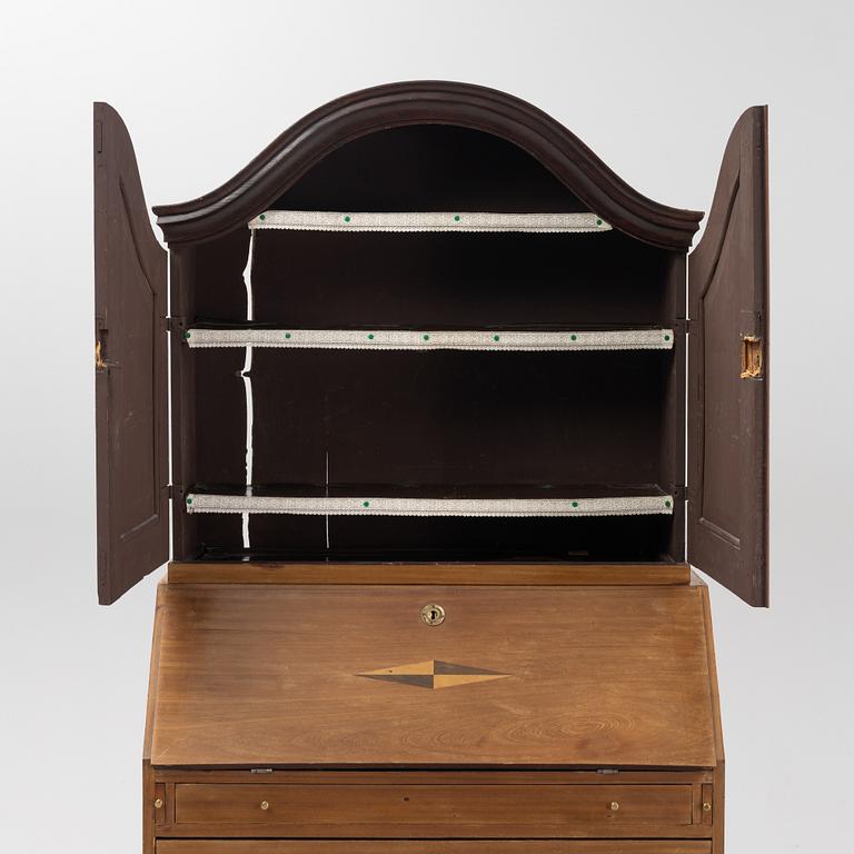 A mahogany-veneered Empire cabinet, first part of the 19th Century.