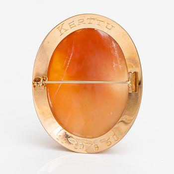 Two brooches and a ring, 14K and 18K gold and sea shell cameos.