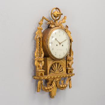 A swedish gustavian wall clock signed by Carl Erik Orbin, Stockholm, active ca 1774-1799.