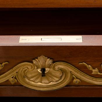 A 20th-century Louis XVI style bookcase.