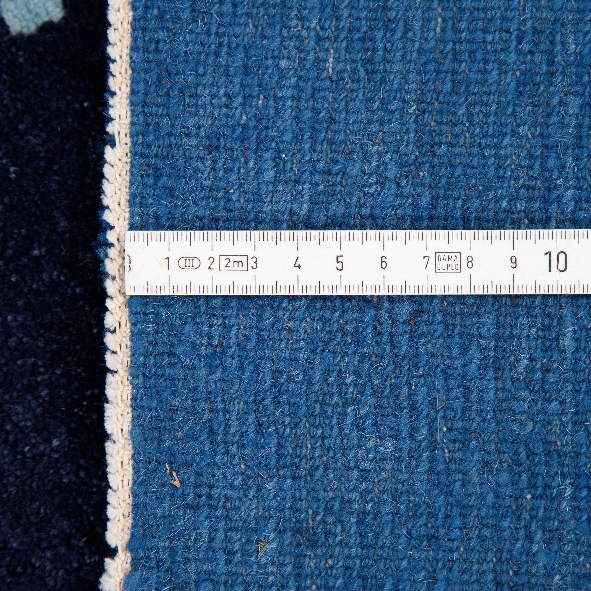 A carpet, China, ca 198 x 198 cm.