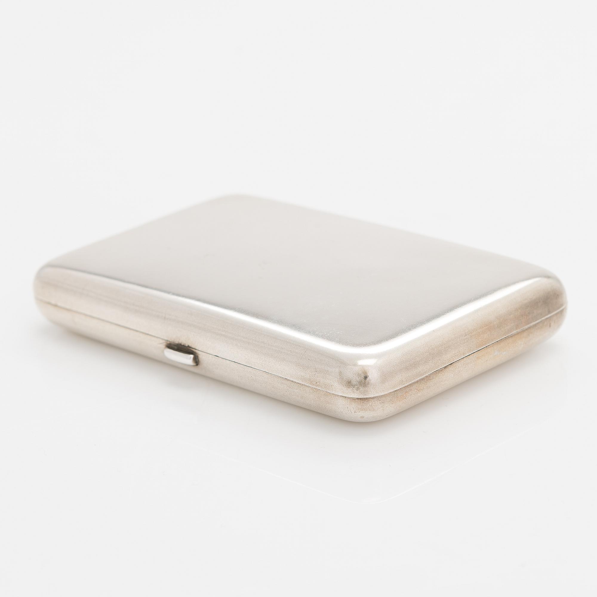 A silver cigarette case, Hlebnikov,  Imperial warrant, unidentified maker's mark, Moscow 1899-1908.