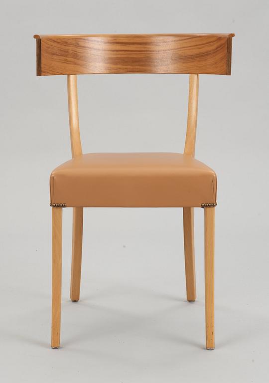 A Josef Frank walnut, beech and brown leather chair, Svenskt Tenn, model 300.