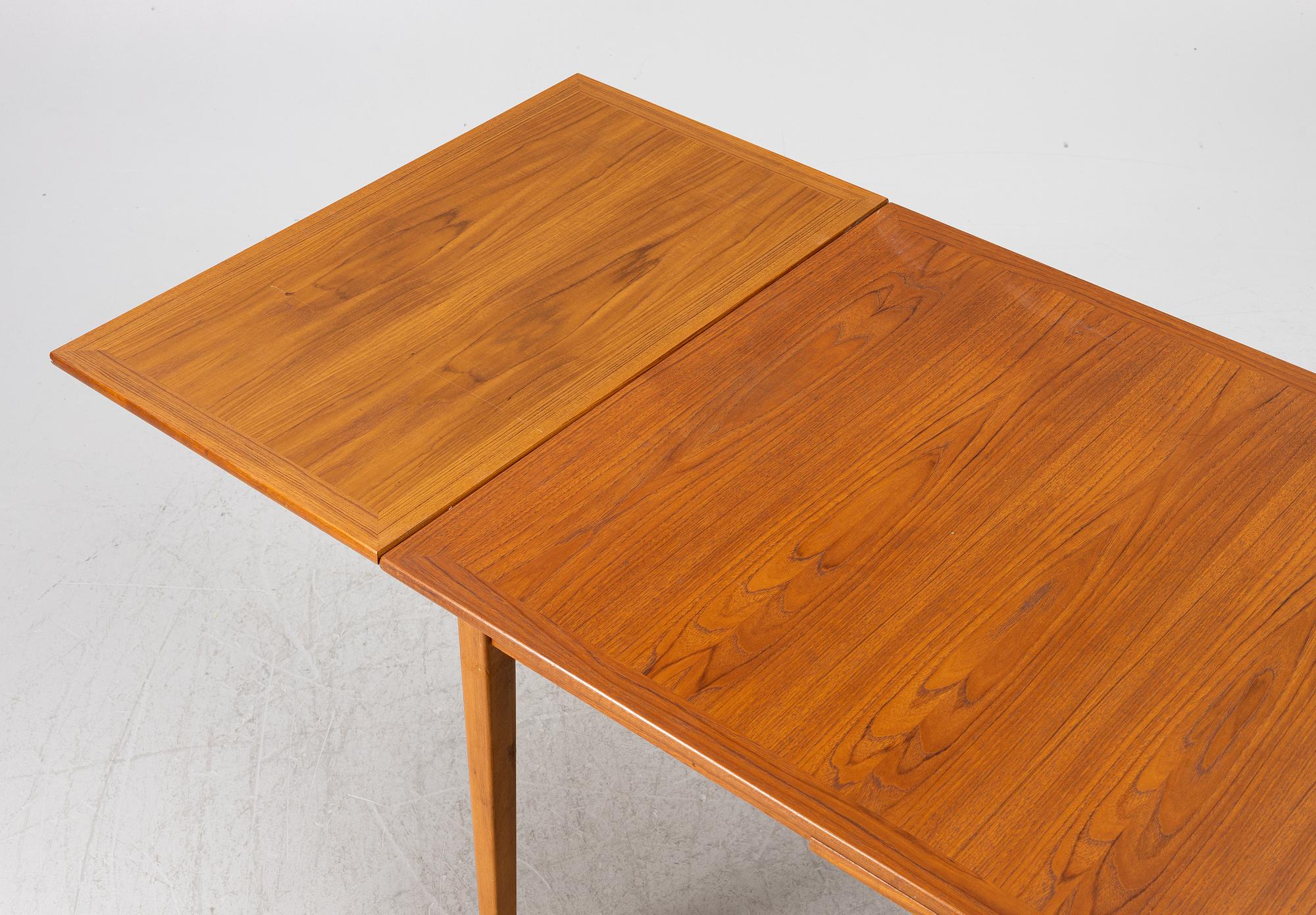 A dining table, teak, 1960s.