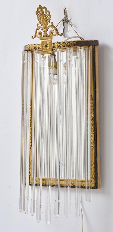 A pair of mirror sconces, 1910's/20's.