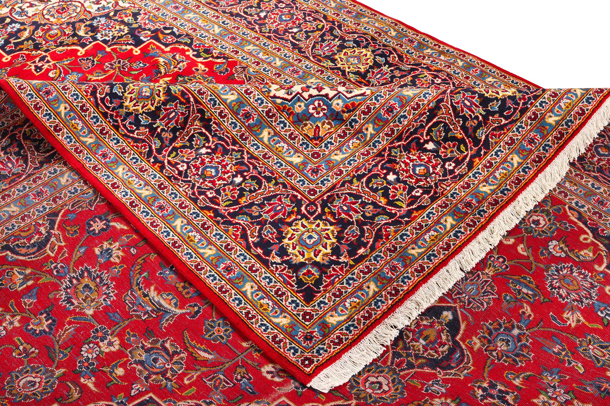 A Keshan carpet, c. 405 x 300 cm.