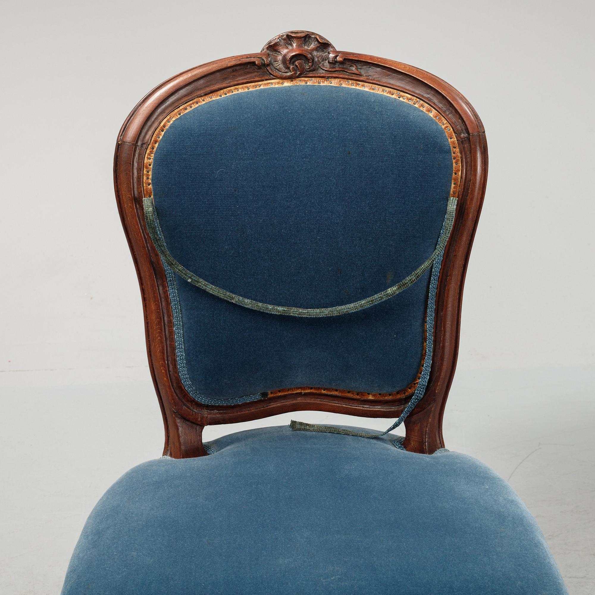 A sofa and a set of four chairs, Rococo revival, late 19th century.