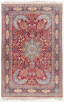 A semi-antique Kirman carpet, c. 275 x 180 cm.