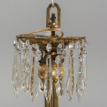 A late 19th century brass ceiling light.