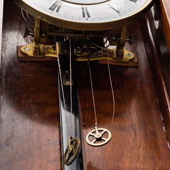 A Lenzkirch walnut wall clock from Germany, 1910s / 20s.