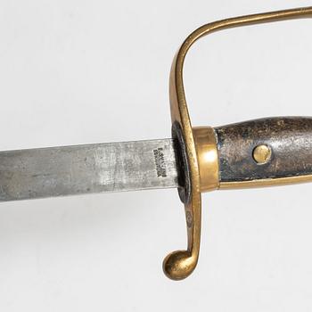 A Swedish police sabre and cutlass, with scabbards.