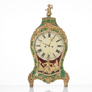 A rococo painted and gilt-brass mounted mantel clock by P. Ernst (watchmaker in Stockholm 1753-84).