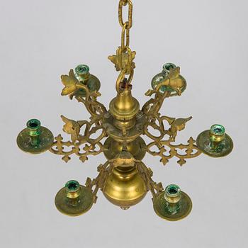 Kynttiläkruunu, messinkiä, 1900-luvun alkupuoli.