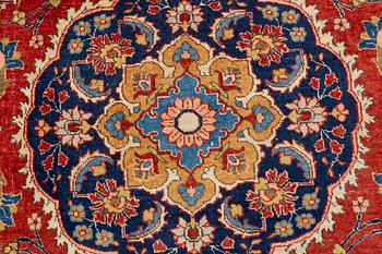 A oriental carpet, ca 320 x 223 cm.