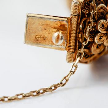 ARMBAND, förgyllt silver och rosatonade stenar, 1900-talets första hälft.