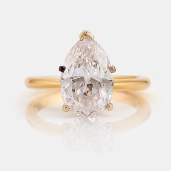 A pear cut diamond ring.