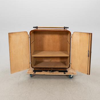 A walnut veneered Art Déco cabinet.