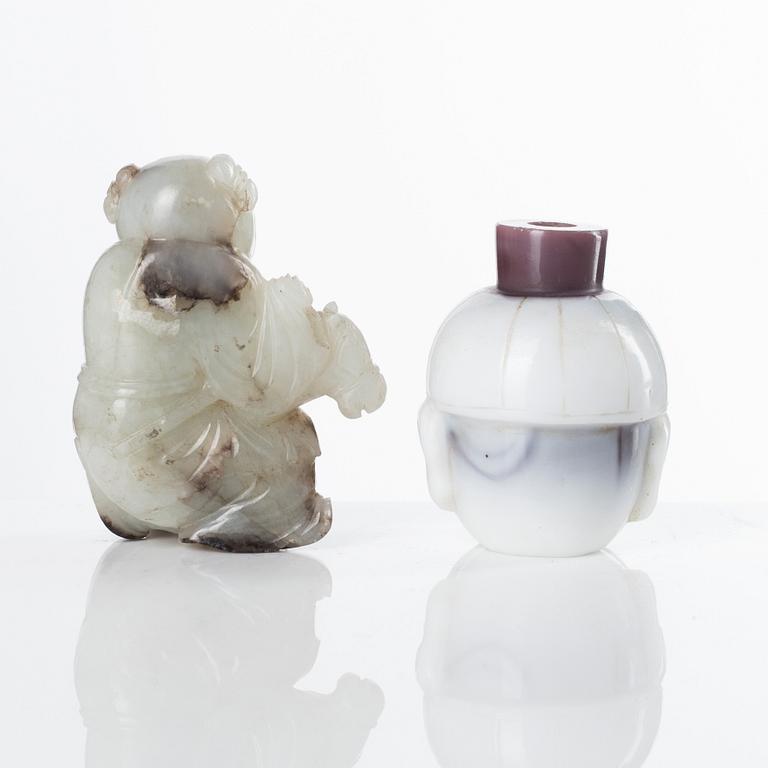 A carved Chinese snuff bottle and a nephrite sculpture, late Qing/20th Century.