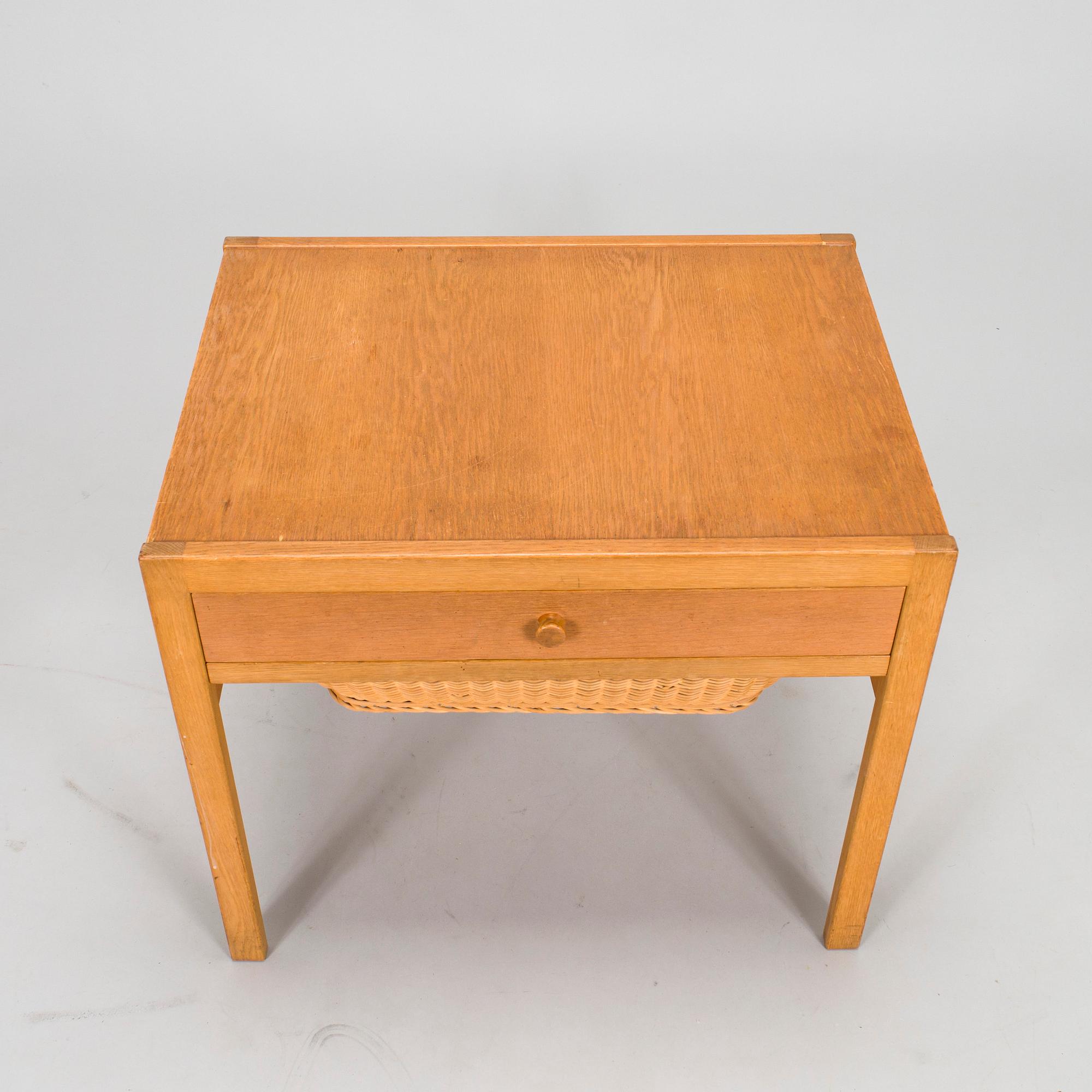 A mid-20th-century sewing table.