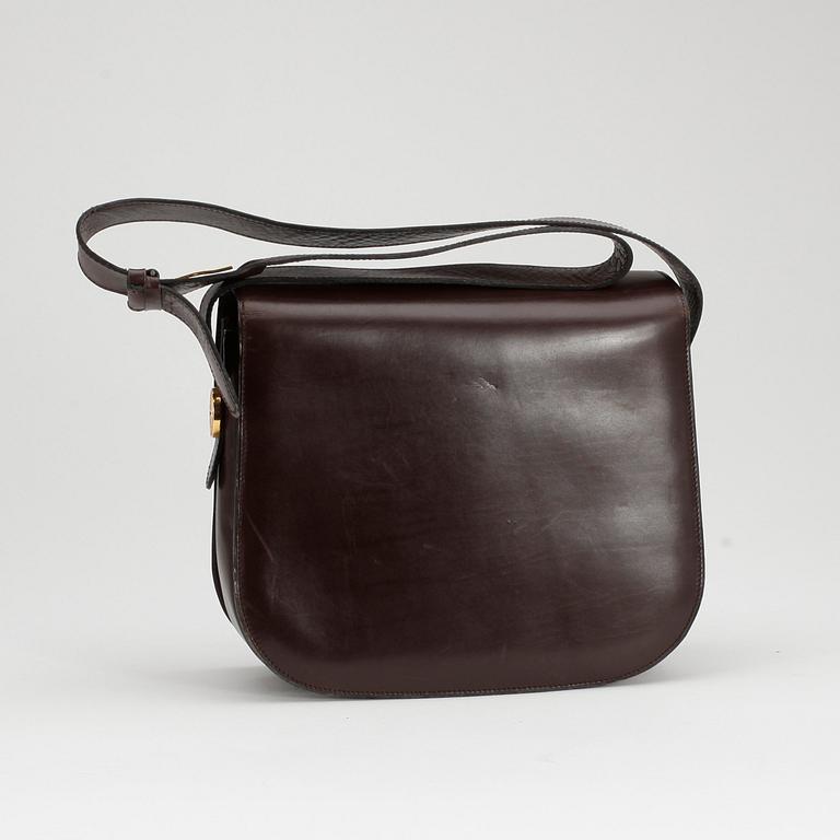 CÉLINE, a brown leather shouldre bag and a belt´.