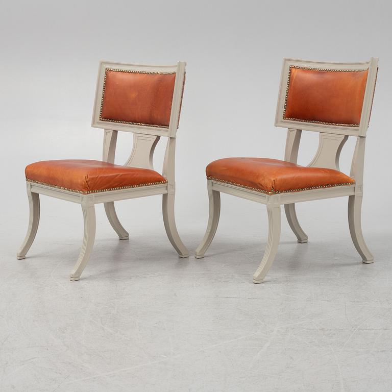 A pair of klismos armchairs, circa 1900.