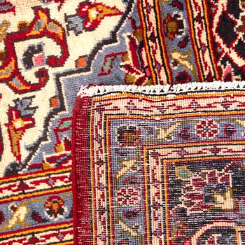 An old Kashan carpet approx 388x270 cm.