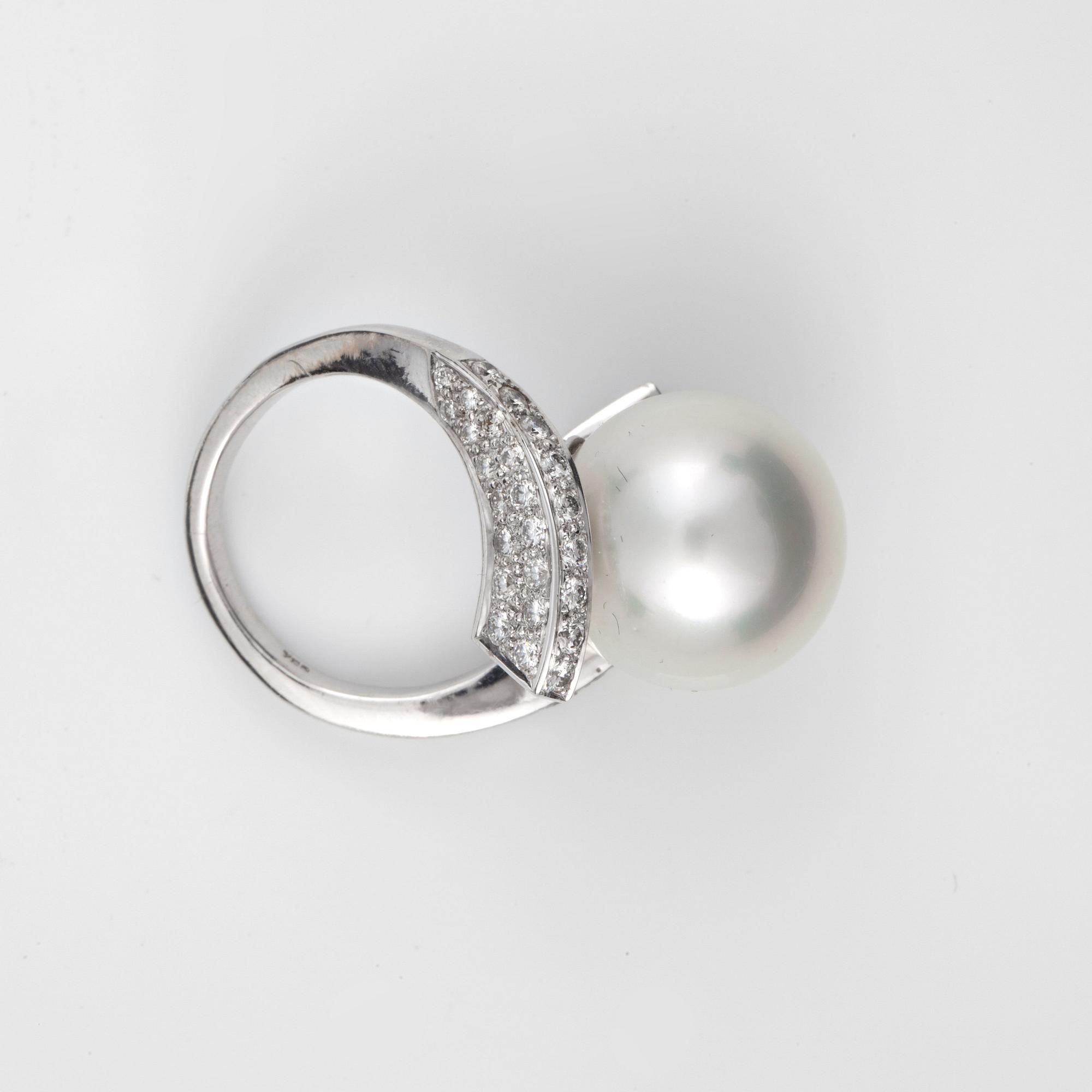 A cultured South sea pearl and brilliant-cut diamond ring. Total carat weight of diamonds circa 1.50 cts.